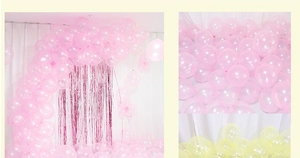 Detailed pink and yellow crystal latex balloons with pink tinsel curtain backdrop