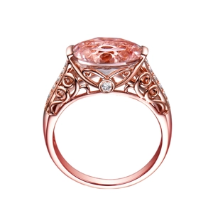 Rose gold morganite ring with cushion cut pink gemstone and vintage filigree detailing