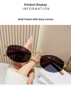 Detail der Vintage-Punk-Sonnenbrille mit goldener Metallfassung und grauen Gläsern