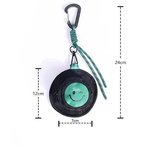 Black round mini nylon coin purse with green wink face and braided lanyard 12cm size