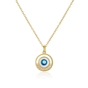 Macro shot of gold-plated pendant with blue evil eye and sparkling cubic zirconia stones