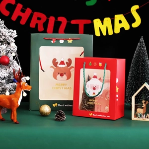 Festive Christmas gift bags with transparent windows, cartoon reindeer and Santa patterns
