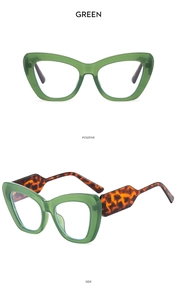 Detail of green cat-eye sunglasses featuring tortoise pattern temples and geometric side view