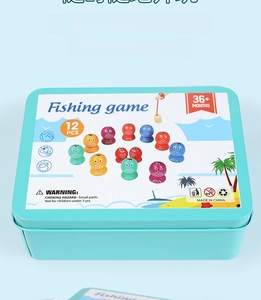 Detail of light blue tin box for magnetic fishing game with 12 colorful fish patterns