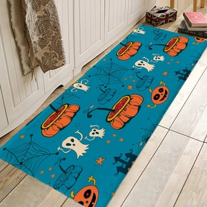 Detail of teal Halloween runner mat featuring pumpkin, ghost and castle patterns in a kitchen