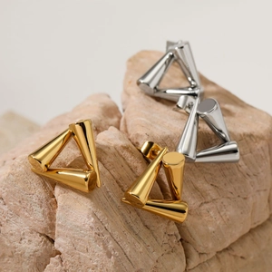 Minimalist geometric triangle stud earrings in polished gold and silver metal finishes