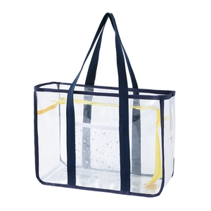 Transparente PVC-Strandtasche mit dunkelblauen Trägern und gelber Sternen-Tasche