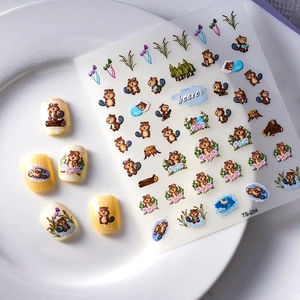 Adhesive nail art stickers featuring cute cartoon beaver and forest elements on nails