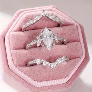 Sparkling pear-cut silver ring set with moon leaf design in pink velvet gift box