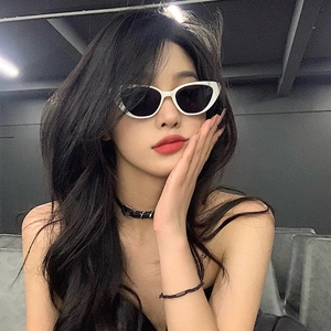 Chic white cat-eye sunglasses with black lenses for women, stylish streetwear accessory