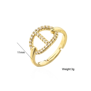 Detail view of 18K gold plated pig nose ring with 11mm diameter and micro-set cubic zirconia