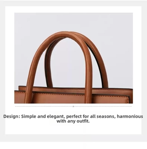 Detail of rolled leather handles with black edge finishing on a brown retro handbag