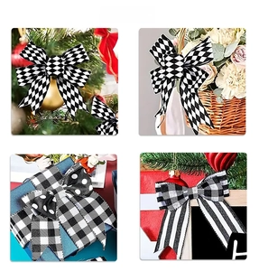 Detail view of black and white striped and checkered Christmas bows for gift wrapping