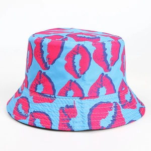 Detail of blue bucket hat with pink lip print pattern and parallel brim stitching