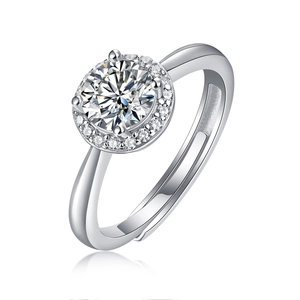 Detailed close-up of a silver halo ring featuring a central round stone and adjustable band
