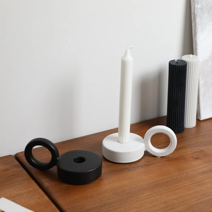 Minimalist ceramic ring candle holder set in matte black and white finishes