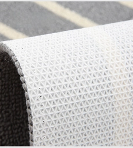 Detailed macro shot of the white TPR non-slip backing with triangle geometric patterns