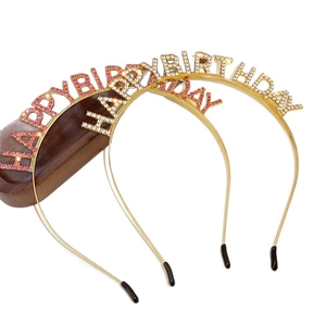 Sparkly rhinestone Happy Birthday headbands in gold and pink for party celebrations