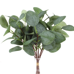 Detailed view of artificial eucalyptus leaves with realistic grey-green texture and white powder