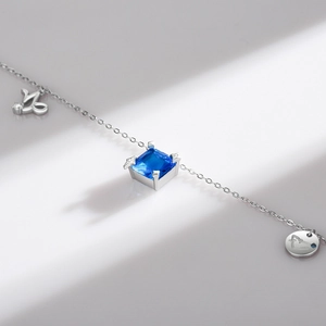 Elegant S925 silver Capricorn necklace featuring a square blue gemstone pendant