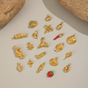 18K gold plated stainless steel ocean charms set featuring seahorse and shell pendants