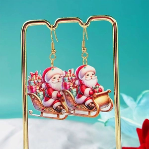 Boucles d'oreilles Père Noël mignonnes en acrylique avec motif festif de traîneau