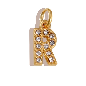 Detailed view of a gold-plated letter R charm pendant with sparkling white zircons