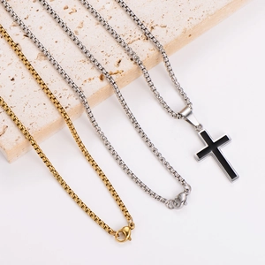 Polished stainless steel cross pendant necklace for men on minimalist stone base