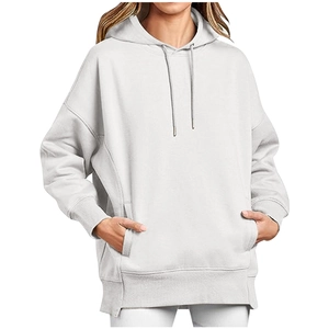 Close-up of white oversized hoodie featuring ribbed cuffs and adjustable drawstring hood
