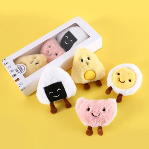 Cartoon plush catnip toys set with fried egg and rice ball shapes in a gift box