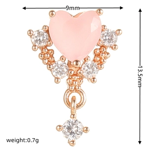 Detailed view of pink heart earring with rose gold base and dimensions 9mm by 13.5mm