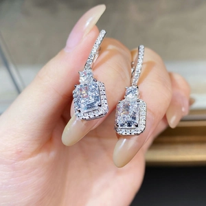 Luxury 925 sterling silver drop earrings with radiant cut cubic zirconia and halo accents