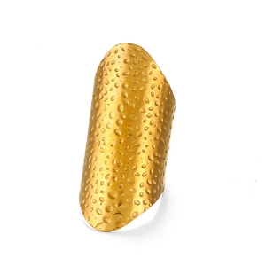 Statement gold-toned stainless steel ring featuring a hammered geometric shield design