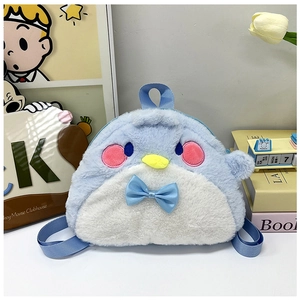 Detail of cute blue plush penguin backpack with satin bow and adjustable straps