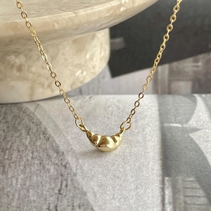 Minimalist 925 sterling silver croissant pendant necklace with golden metal finish