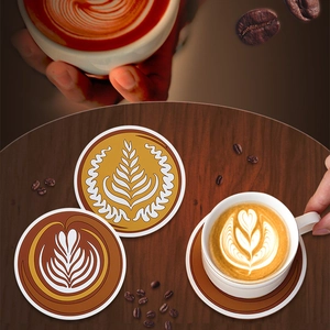 Round heat-resistant PVC placemats with latte art patterns on dark wooden table