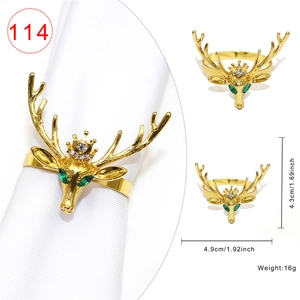 Detailed view of golden deer napkin ring with dimensions and weight measurements