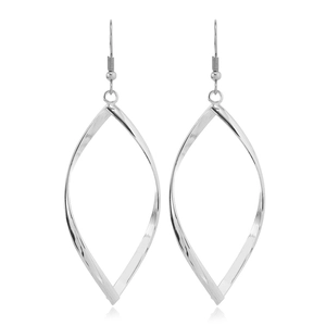 Macro view of silver geometric hollow leaf earrings with modern twisted metal texture