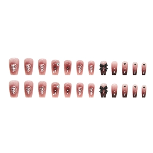 Pink brown gradient press-on nails with 3D black bows and white rose patterns