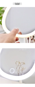 Detail showing the LED makeup mirror with circular light strip and touch sensor control