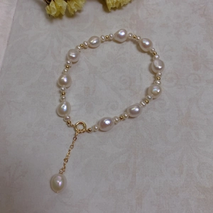 Detailed view of Baroque pearls with 14K gold filled chain and small gold spacer beads