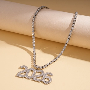 Detail of silver 2026 numeric pendant on sparkling tennis chain with white stones