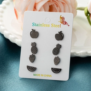 Set of 4 black stainless steel fruit stud earrings featuring apple strawberry pineapple designs