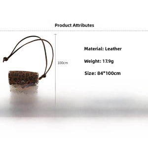 Detail view of mini leopard print leather bag pendant with 100cm strap and 17.9g weight