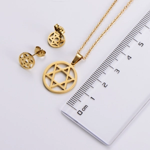 Detailed view of hexagram jewelry set with measurement scale for size reference