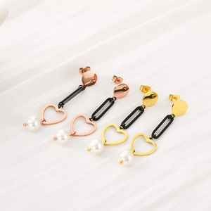 Fashionable heart and pearl drop earrings in gold and rose gold stainless steel finishes