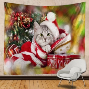 Detail of Christmas cat tapestry showing soft fabric texture on a grey textured wall