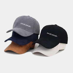 Close-up of Mama embroidery on corduroy baseball caps in multiple colors for women