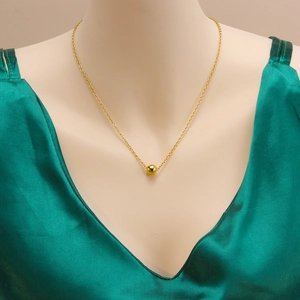 Minimalist 18K gold plated stainless steel bead necklace with a polished gold ball
