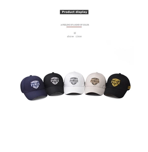 Detailed view of multi-color cotton baseball caps with embroidered FORCE lettering